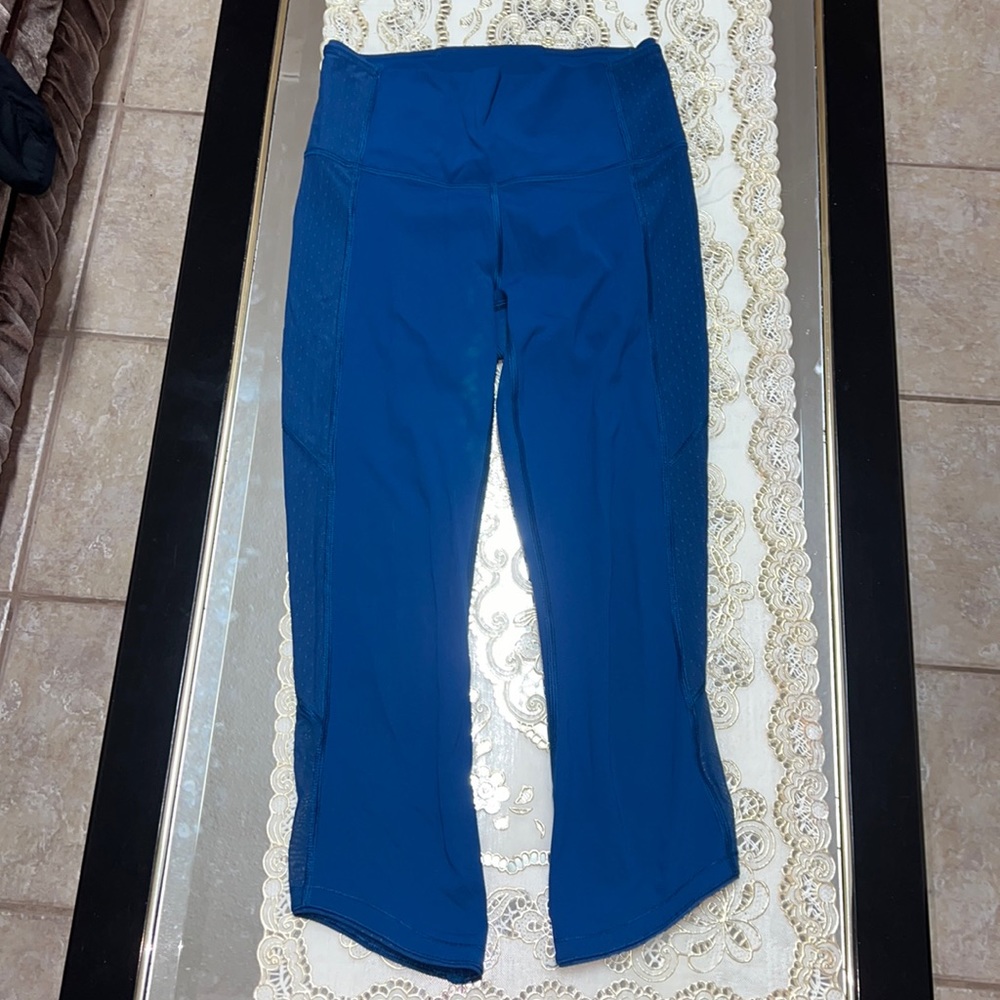 Lululemon Poseidon blue Body Con Crop leggings with mesh inserts